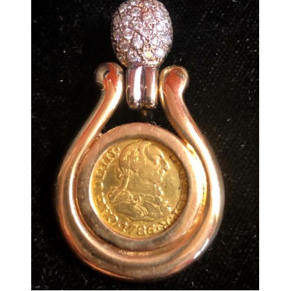 Gold One-Half Escudo dated 1781 in a 14K Gold and 1/4 Carat Diamond Bezel. GC20-2392
